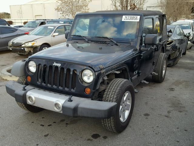 1J4GB39169L723069 - 2009 JEEP WRANGLER U BLACK photo 2