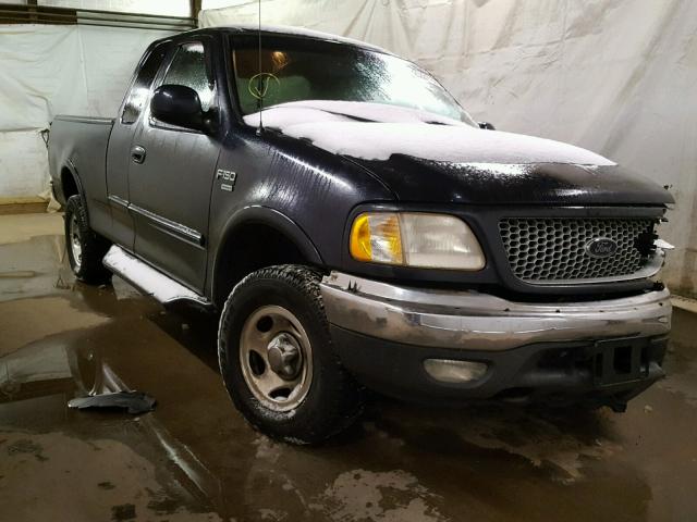 2FTRX18L3XCA69212 - 1999 FORD F150 BLUE photo 1