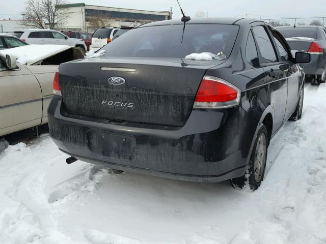 1FAHP34NX9W128798 - 2009 FORD FOCUS S BLACK photo 4