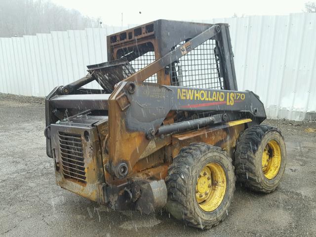 169890 - 2001 NEWH SKIDSTEER YELLOW photo 4