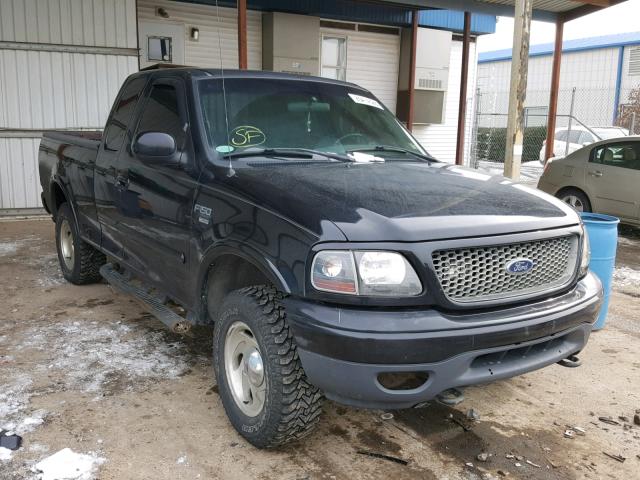 1FTRX18W61NA18587 - 2001 FORD F150 BLACK photo 1