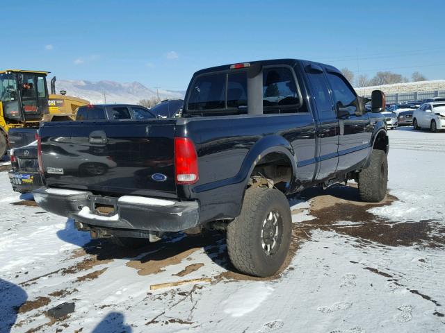 1FTWX31P05EC28903 - 2005 FORD F350 SRW S BLACK photo 4