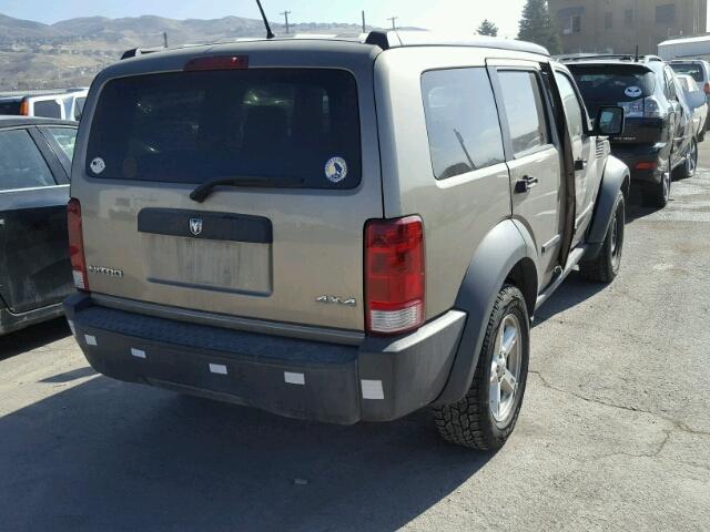 1D8GU28K77W592624 - 2007 DODGE NITRO SXT CREAM photo 4