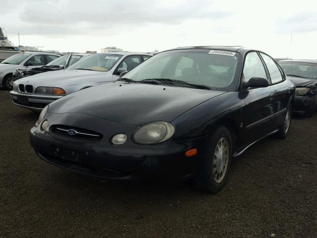 1FAFP53S3XG142608 - 1999 FORD TAURUS SE BLACK photo 2