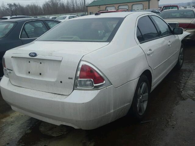 3FAHP07Z59R131298 - 2009 FORD FUSION SE WHITE photo 4