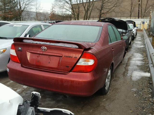 4T1BF30KX2U002470 - 2002 TOYOTA CAMRY LE RED photo 4