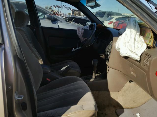 JT2BG12K4T0387366 - 1996 TOYOTA CAMRY DX GOLD photo 5