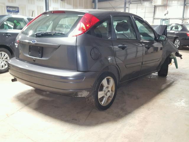 1FAHP37N67W240703 - 2007 FORD FOCUS ZX5 SILVER photo 4