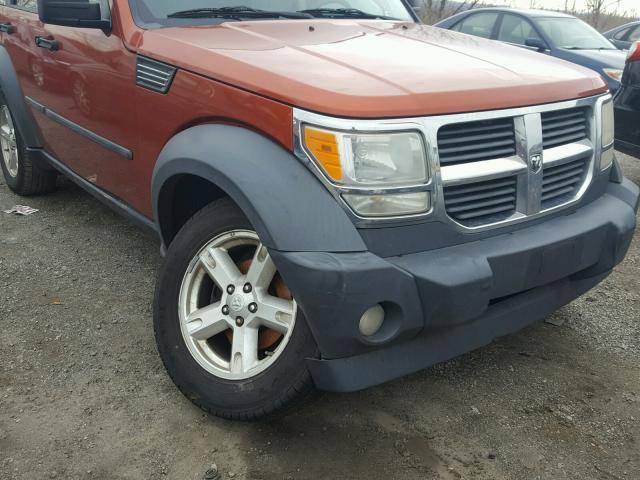 1D8GU28K27W598895 - 2007 DODGE NITRO SXT ORANGE photo 9