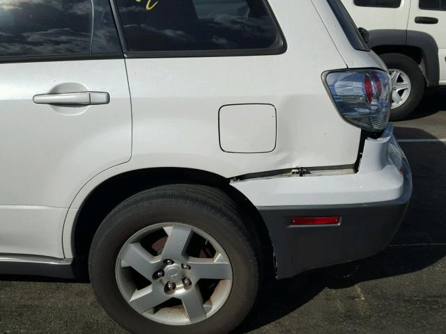 JA4LZ41F24U007182 - 2004 MITSUBISHI OUTLANDER WHITE photo 9