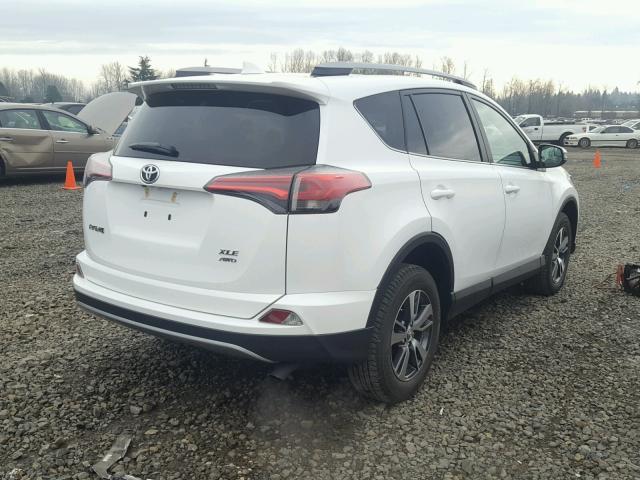 2T3RFREV6HW641322 - 2017 TOYOTA RAV4 XLE WHITE photo 4