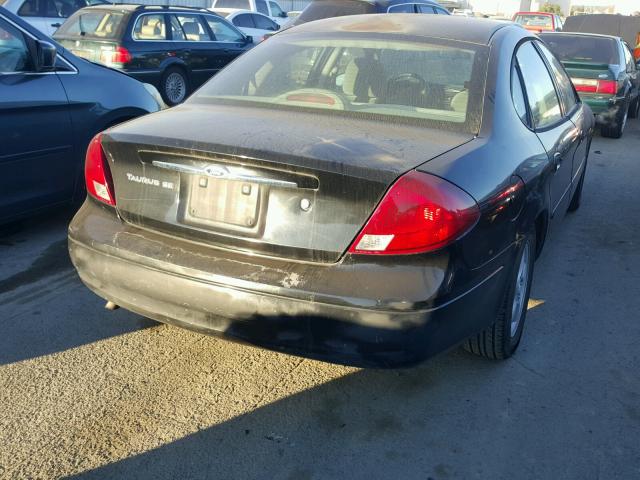 1FAFP5321YG151826 - 2000 FORD TAURUS SE BLACK photo 4