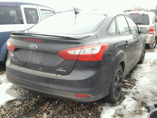 1FAHP3F2XCL451499 - 2012 FORD FOCUS SE BLACK photo 4