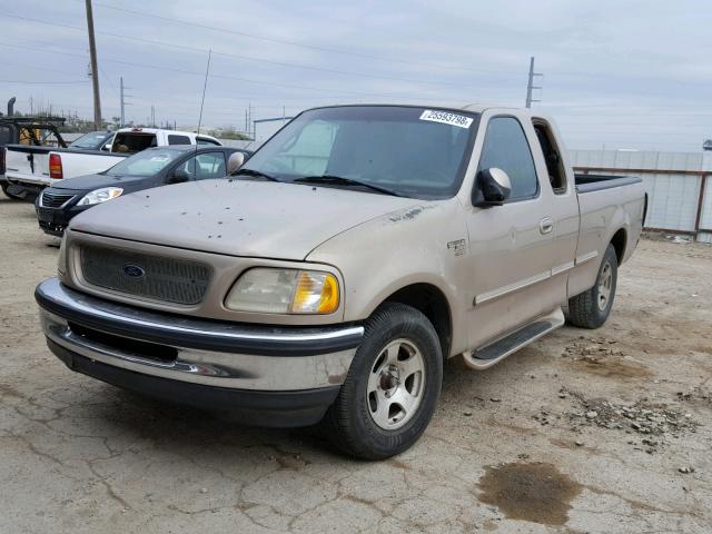 2FTZX1764WCA37525 - 1998 FORD F150 GREEN photo 2