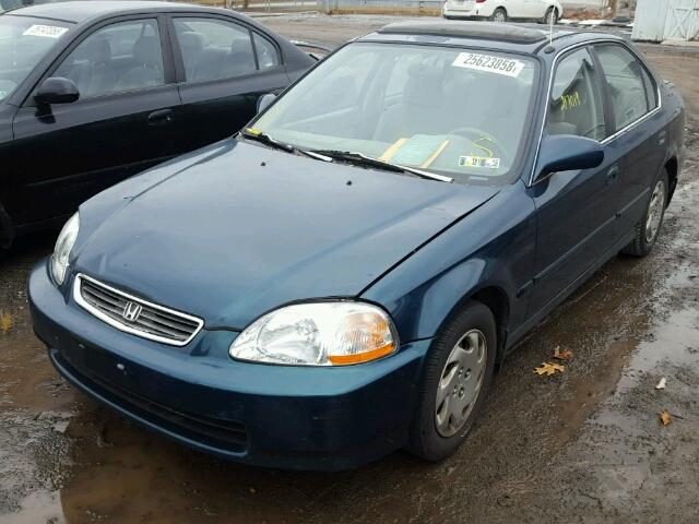 2HGEJ8641VH557502 - 1997 HONDA CIVIC EX BLUE photo 2