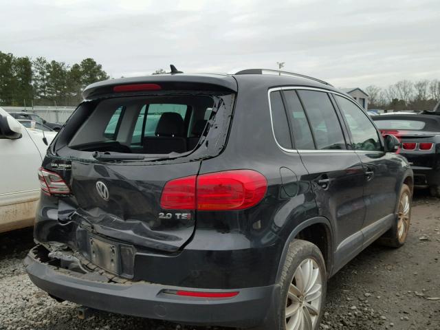 WVGAV3AX7EW562822 - 2014 VOLKSWAGEN TIGUAN S BLACK photo 4