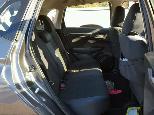 JHMGK5H56GS010700 - 2016 HONDA FIT LX Gris photo 6