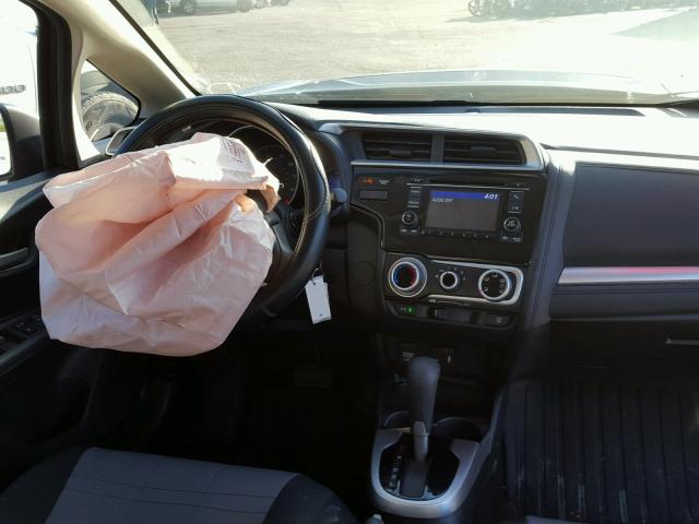 JHMGK5H56GS010700 - 2016 HONDA FIT LX Gris photo 9