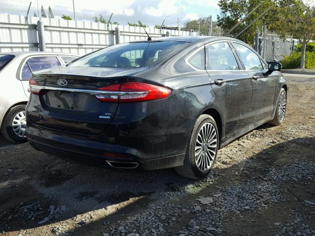 3FA6P0H95HR112738 - 2017 FORD FUSION SE BLACK photo 4