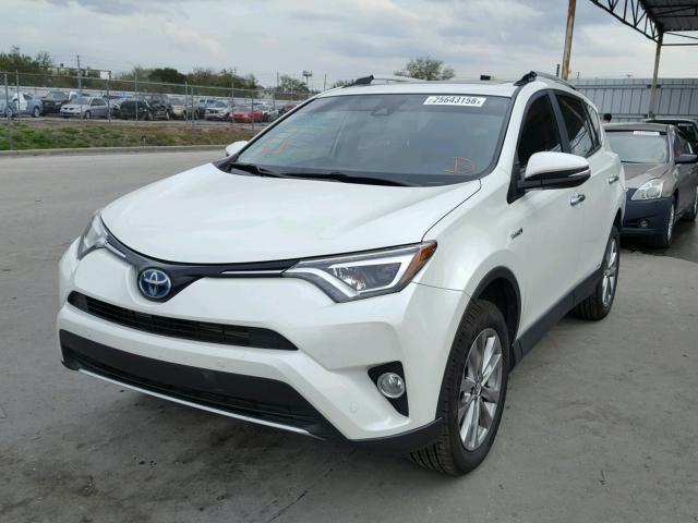 JTMDJREVXGD001439 - 2016 TOYOTA RAV4 HV LI WHITE photo 2