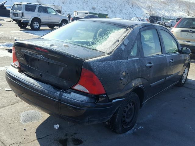 1FAFP33P82W317739 - 2002 FORD FOCUS LX BLACK photo 4