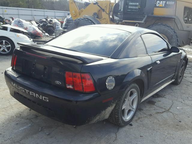 1FAFP4044YF245740 - 2000 FORD MUSTANG BLACK photo 4