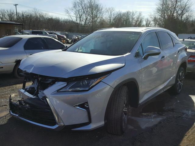 2T2BZMCAXHC114885 - 2017 LEXUS RX 350 SILVER photo 2