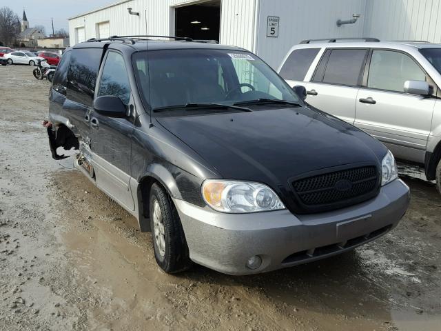 KNDUP131X46584711 - 2004 KIA SEDONA EX BLACK photo 1