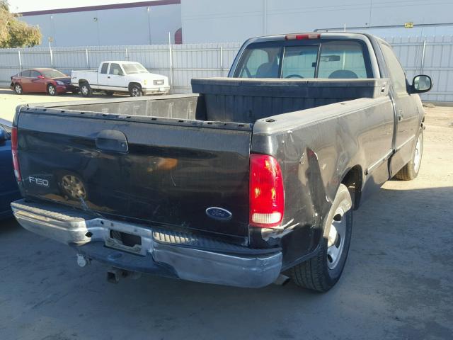 1FTZF176XWNA88072 - 1998 FORD F150 BLACK photo 4