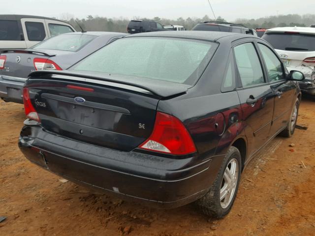 1FAFP34341W358668 - 2001 FORD FOCUS SE BLACK photo 4