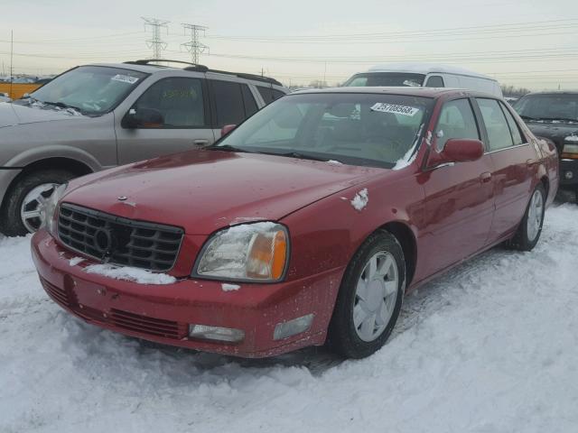 1G6KF57911U177081 - 2001 CADILLAC DEVILLE DT RED photo 2