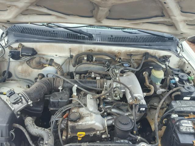 4TANL42N5XZ554973 - 1999 TOYOTA TACOMA WHITE photo 7