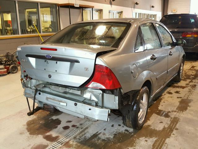 1FAFP34313W119338 - 2003 FORD FOCUS SE C BLUE photo 4