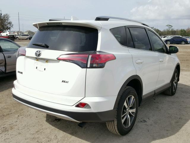 JTMWFREV3GJ067018 - 2016 TOYOTA RAV4 XLE WHITE photo 4