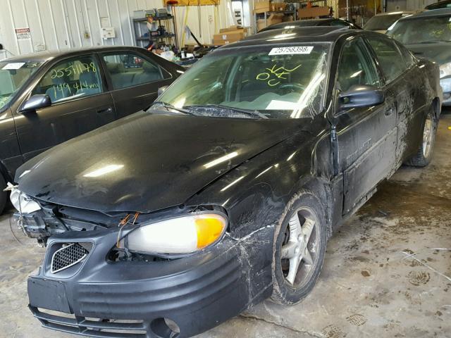 1G2NV52E81C122462 - 2001 PONTIAC GRAND AM G BLACK photo 2