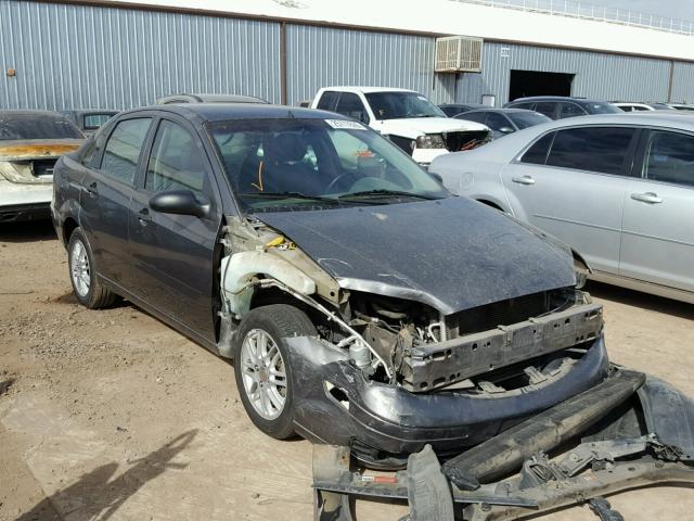 1FAFP34N05W135034 - 2005 FORD FOCUS ZX4 GRAY photo 1