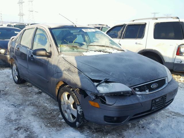 1FAFP34N07W311518 - 2007 FORD FOCUS ZX4 GRAY photo 1