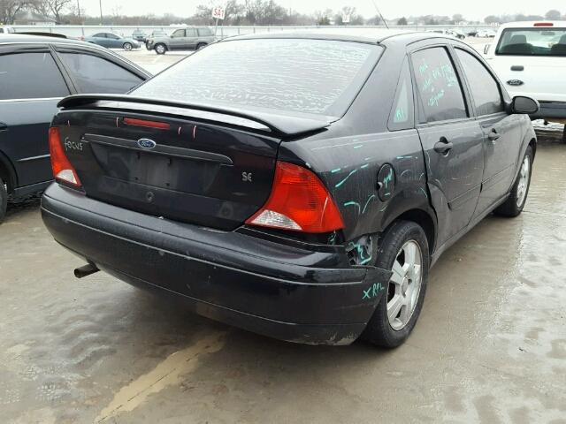 1FAFP34333W154463 - 2003 FORD FOCUS SE C BLACK photo 4