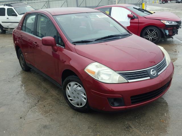 3N1BC11E99L371581 - 2009 NISSAN VERSA S RED photo 1