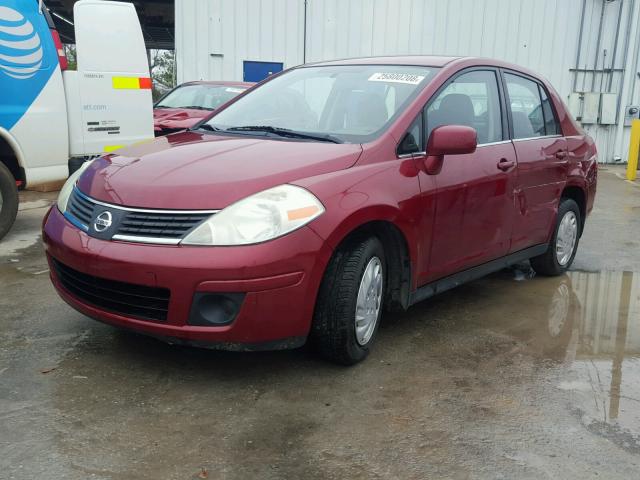 3N1BC11E99L371581 - 2009 NISSAN VERSA S RED photo 2