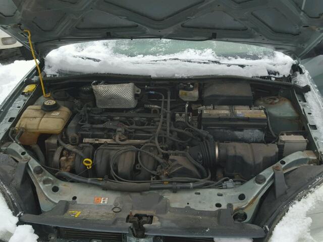 1FAFP34N25W285484 - 2005 FORD FOCUS ZX4 GRAY photo 7