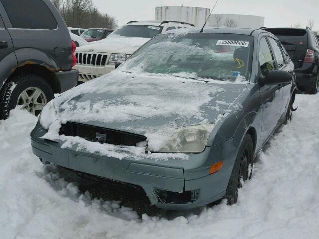 1FAFP34N25W285484 - 2005 FORD FOCUS ZX4 GRAY photo 9