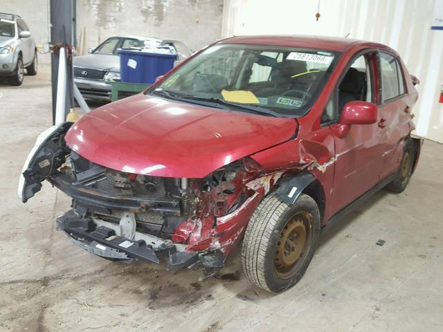 3N1BC11E09L440755 - 2009 NISSAN VERSA S RED photo 2