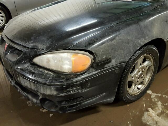 1G2NW52E52M684389 - 2002 PONTIAC GRAND AM G BLACK photo 9