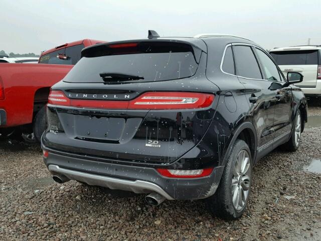 5LMCJ3C92GUJ22117 - 2016 LINCOLN MKC RESERV BLACK photo 4