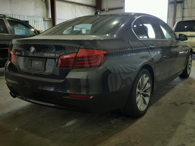 WBA5A7C58GG148981 - 2016 BMW 528 XI Schwarz Foto 4