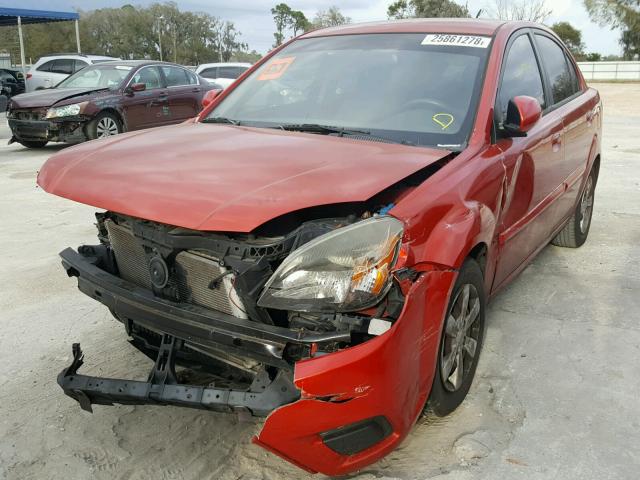 KNADH4A33A6641682 - 2010 KIA RIO LX ORANGE photo 2