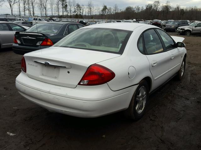 1FAFP56S8YG156159 - 2000 FORD TAURUS SEL WHITE photo 4