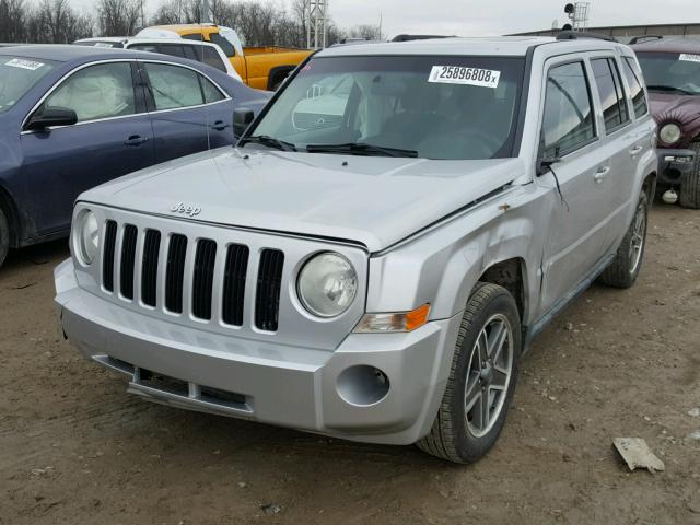 1J4NF2GB0AD522767 - 2010 JEEP PATRIOT SP SILVER photo 2