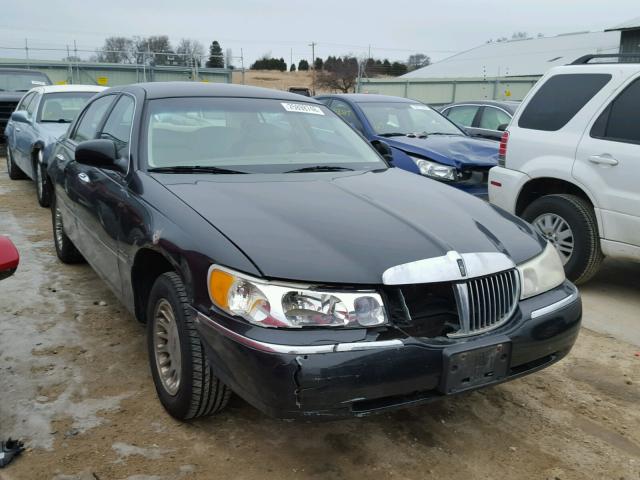 1LNHM83W9YY940117 - 2000 LINCOLN TOWN CAR C BLACK photo 1